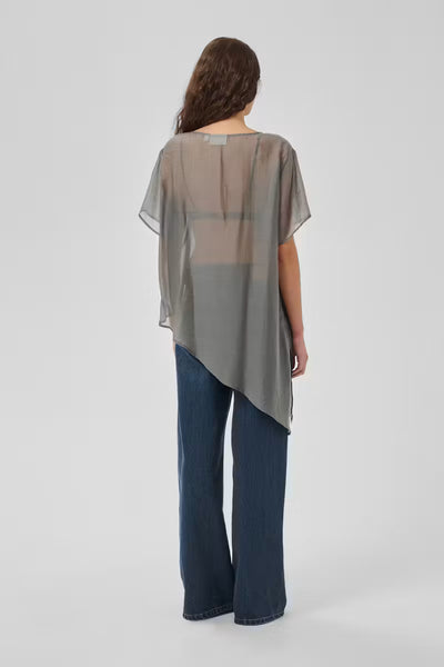 Back view of My Essential Wardrobe Smilla grey sheer short sleeve asymmetric top