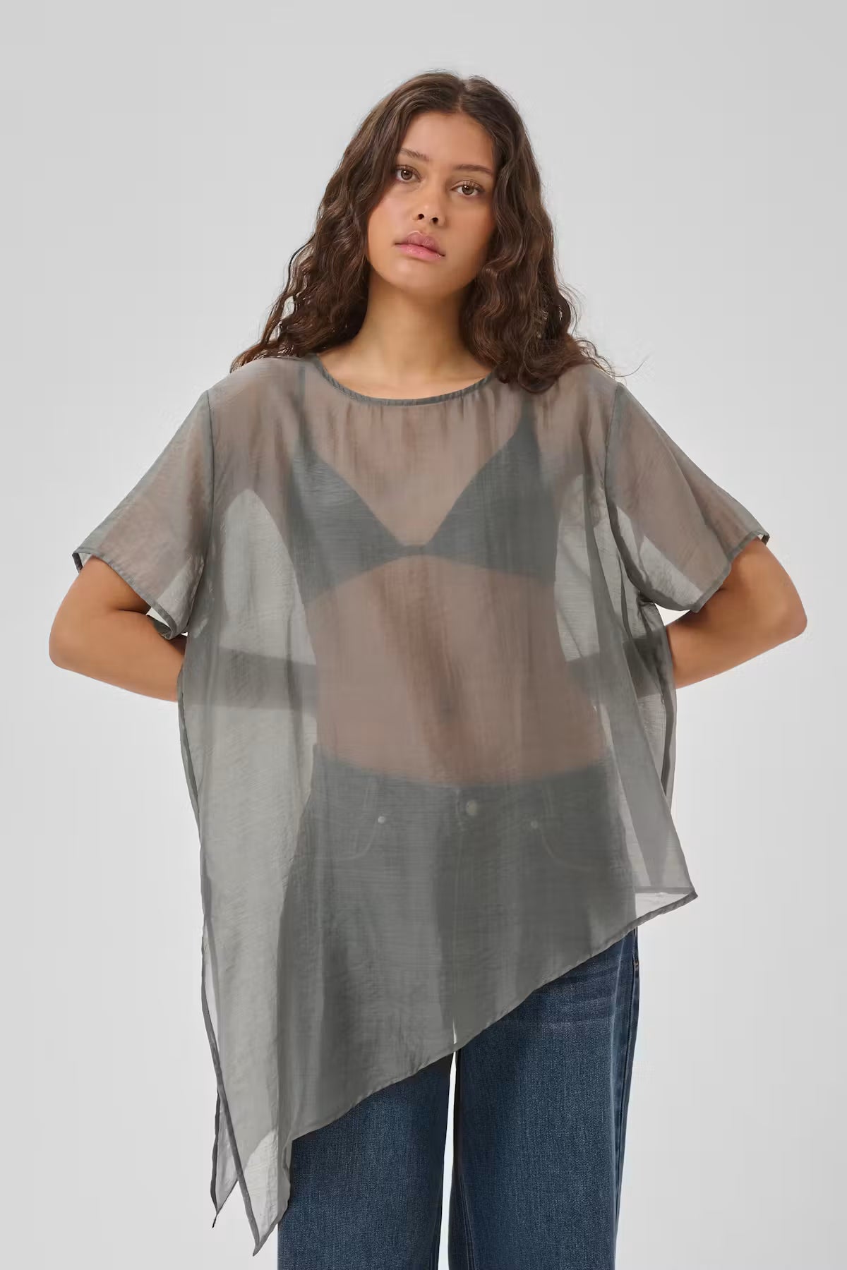 My Essential Wardrobe Smilla grey sheer asymmetric top styled front view