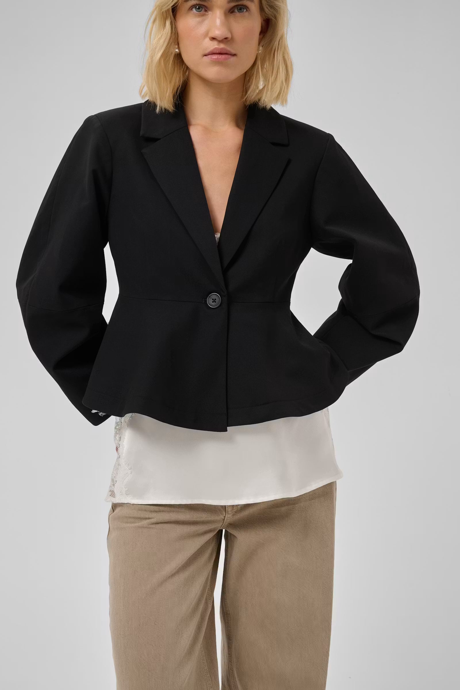 My Essential Wardrobe Evie black peplum blazer styled front view