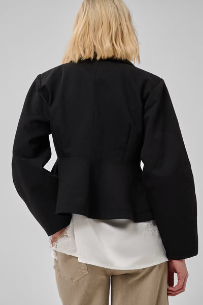 Close-up back view of My Essential Wardrobe Evie shaped blazer and flared hem