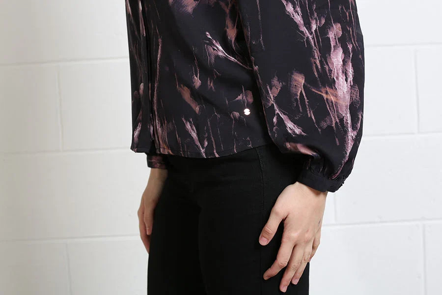 Close-up of Rant & Rave Naomi black mauve print blouse sleeve detail