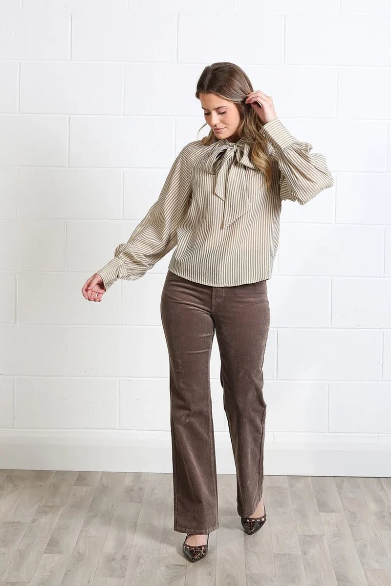 Rant & Rave Natalia light coffee bow neck blouse styled with brown trousers