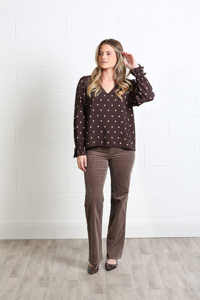 Rant & Rave Sophia brown and cream spot print blouse styled with brown trousers