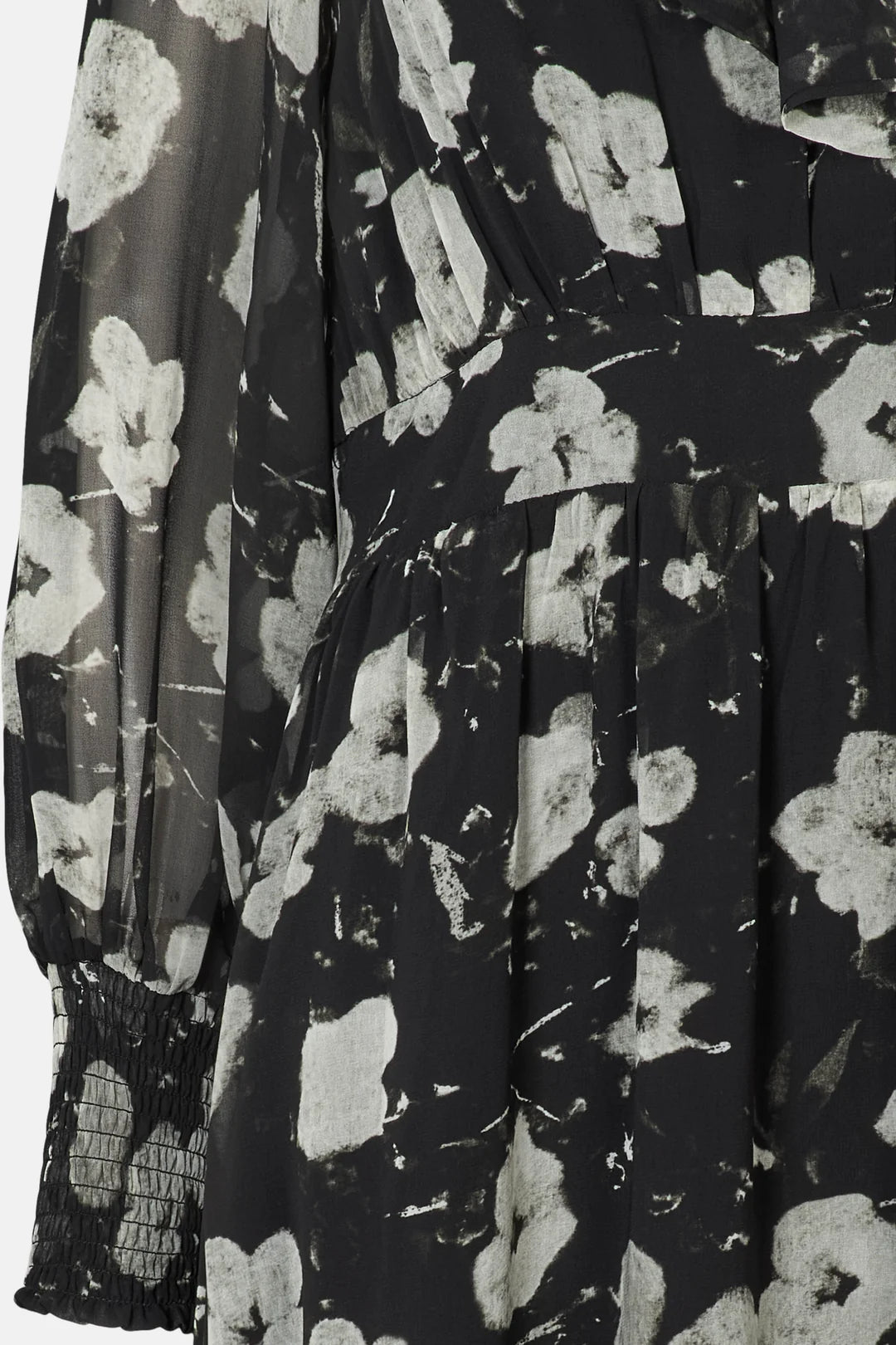 Close-up of Rue de Femme Paxton long sheer sleeves with cuff detail