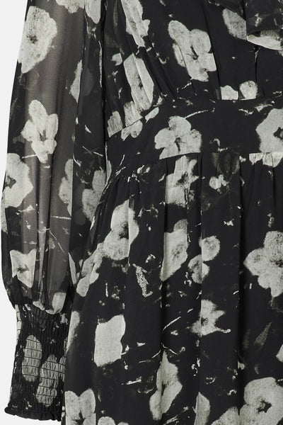 Close-up of Rue de Femme Paxton long sheer sleeves with cuff detail