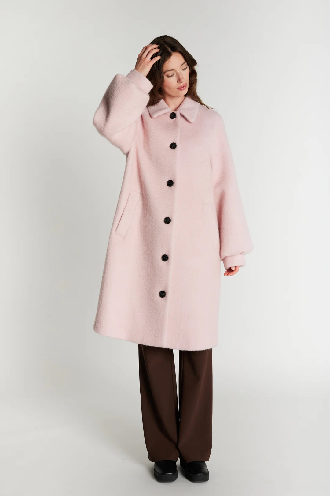 Rue de Femme Addison pink balloon sleeve coat three-quarter front view