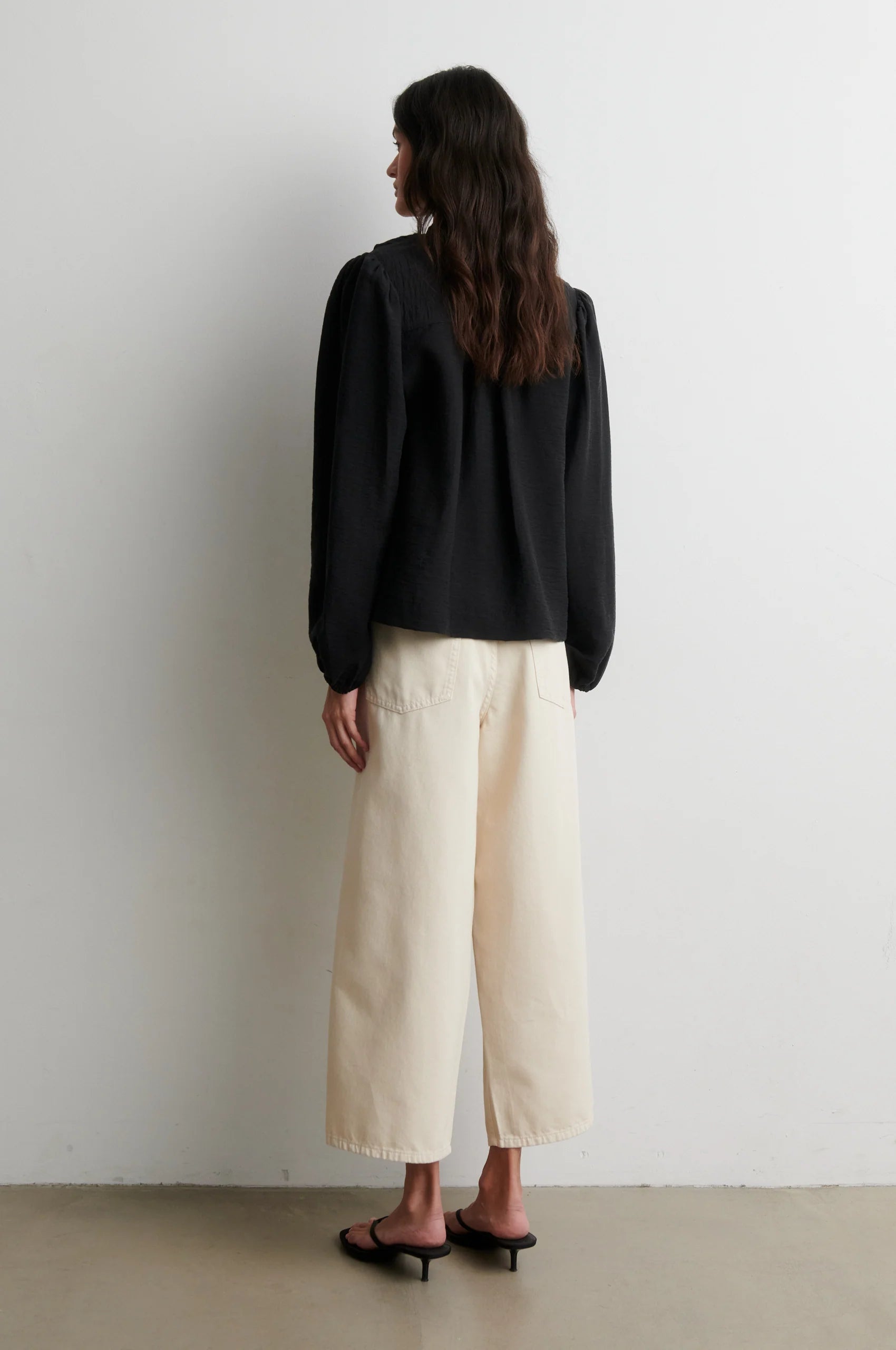 Back view of Second Female Rayna loose-fit black blouse